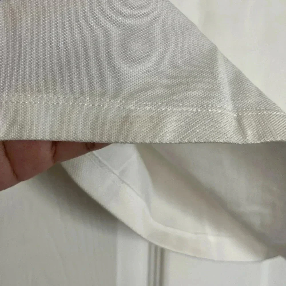 Tory Burch Performance Pleated Collar Sleeveless Polo